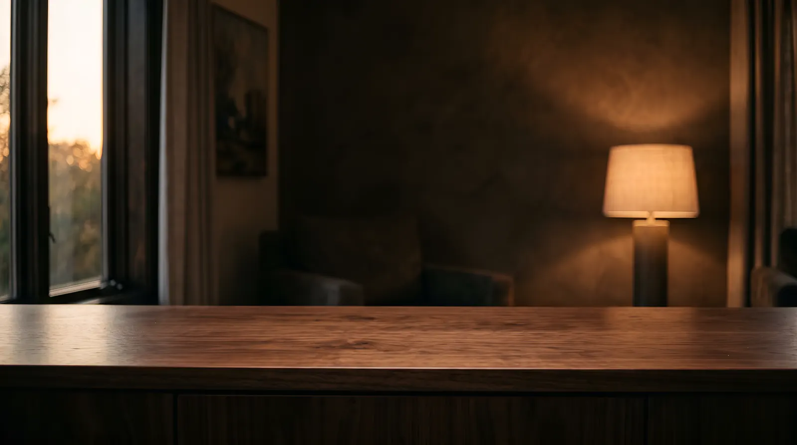 A walnut sideboard at dusk